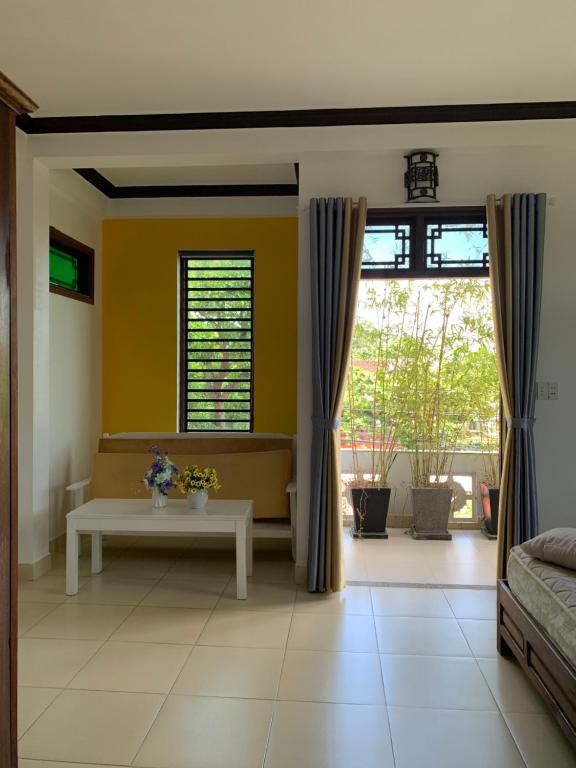 Posezení v ubytování Cheerful Hoi An Hostel