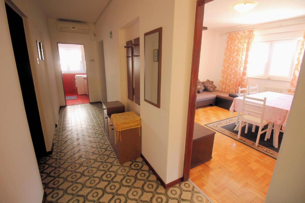 Postel nebo postele na pokoji v ubytování Apartmens Adriana