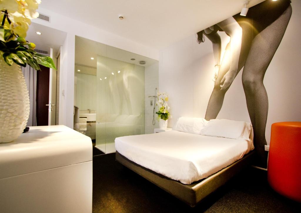 Postel nebo postele na pokoji v ubytování Green Hotel Motel