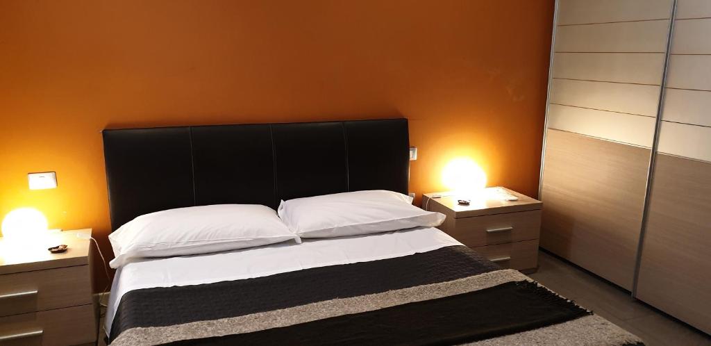 Posteľ alebo postele v izbe v ubytovaní Agorà Residenza