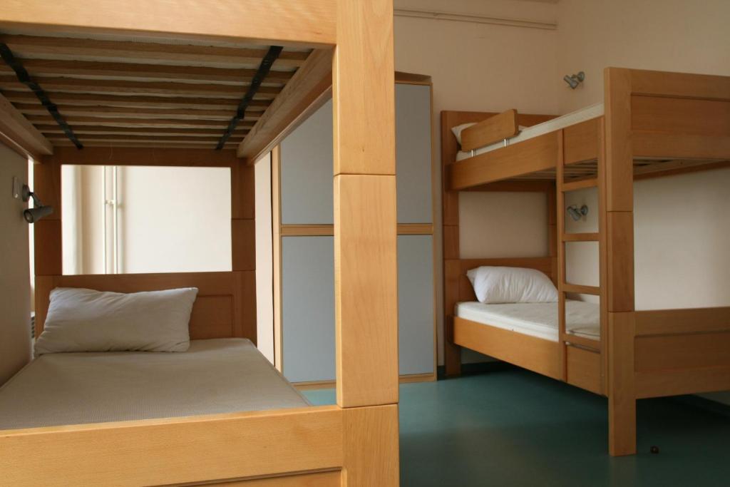 Postel nebo postele na pokoji v ubytování HI Hostel Rijeka