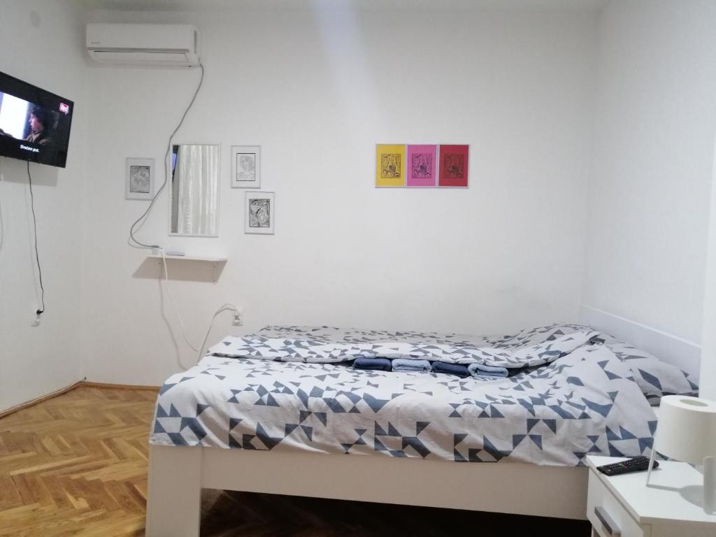 Postel nebo postele na pokoji v ubytování Apartman Nana Jagodina