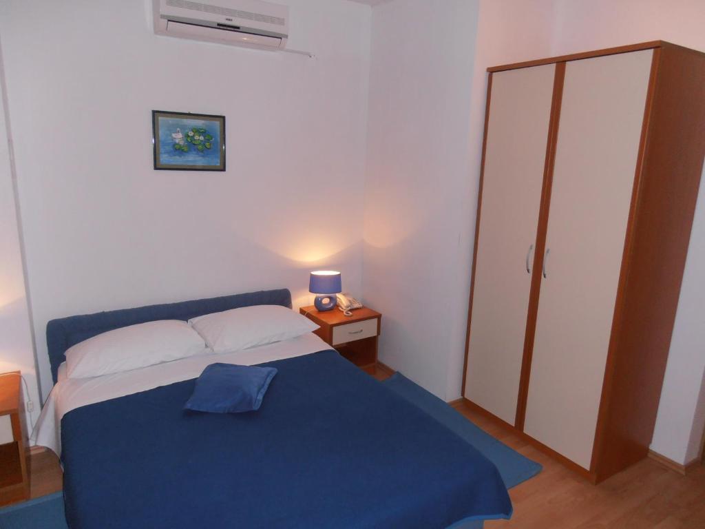 Postel nebo postele na pokoji v ubytování Hotel Metković