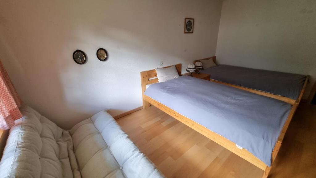 Krevet ili kreveti u jedinici u objektu Snow+Surf B&B