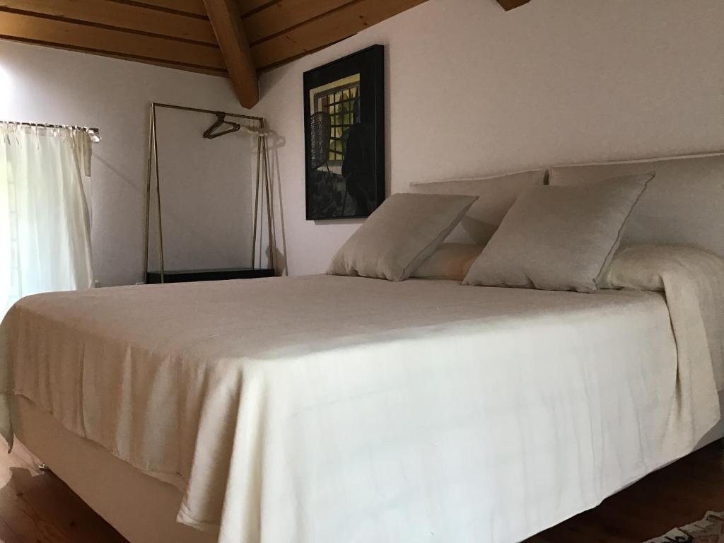 Posteľ alebo postele v izbe v ubytovaní La Foresteria di Villa Gorgo