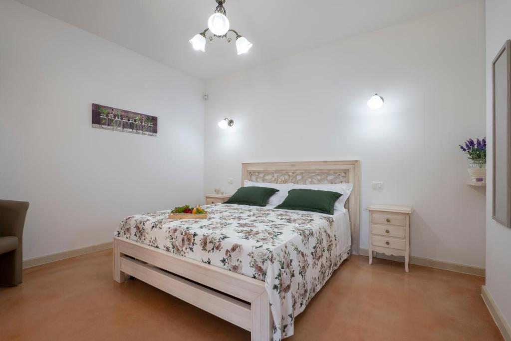 Łóżko lub łóżka w pokoju w obiekcie Arbor Exclusive B&B