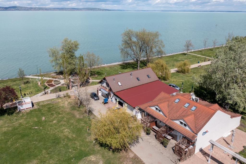 an aerial view of a house with a red roof at Pelso Apartman in Zamárdi