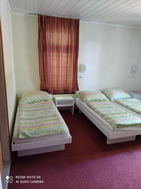 Postel nebo postele na pokoji v ubytování Sobe GRAJSKA
