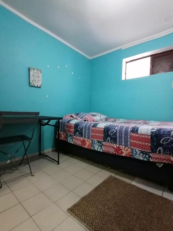 Postel nebo postele na pokoji v ubytování Hostal Caleta Abarca