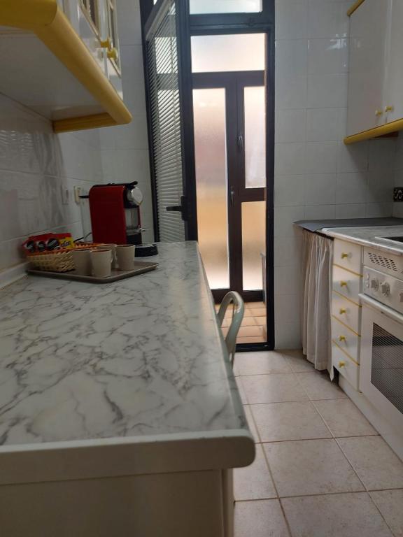 Kuchyň nebo kuchyňský kout v ubytování La cabaña