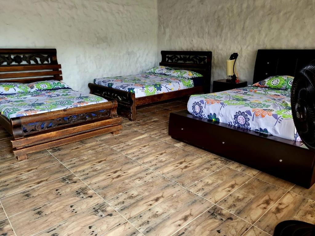 Ένα ή περισσότερα κρεβάτια σε δωμάτιο στο Cabañas VILLA PAOLA