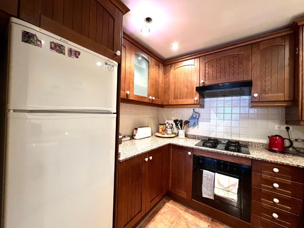 Kuchyňa alebo kuchynka v ubytovaní Apartament Deluxe Espot - L'Amfitriona