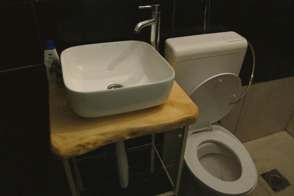 a bathroom with a sink and a toilet at Hostel Ka Doma in Cetinje