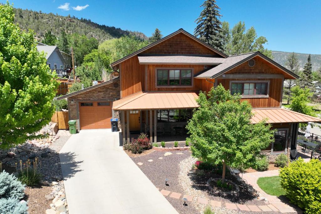 a home in the mountains with a driveway at Durango Deluxe Townhome in Durango
