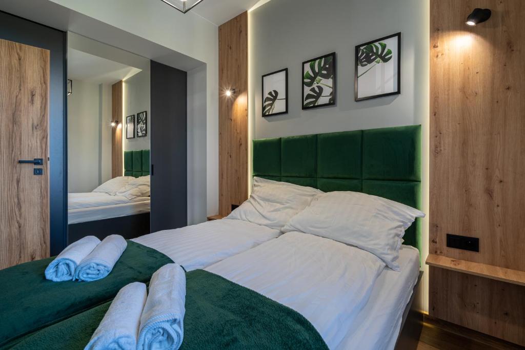 Posteľ alebo postele v izbe v ubytovaní Apartament No 34 Green - Holiday Home Zator