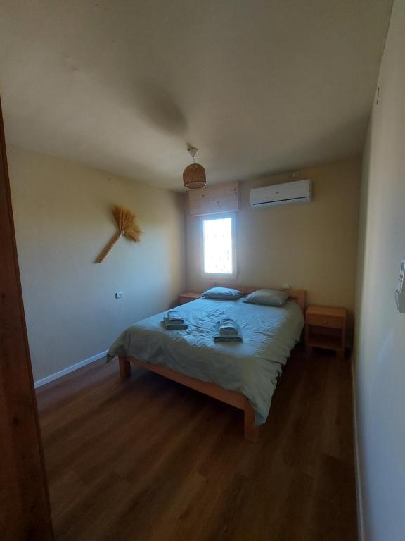 Postel nebo postele na pokoji v ubytování Desert Tribe