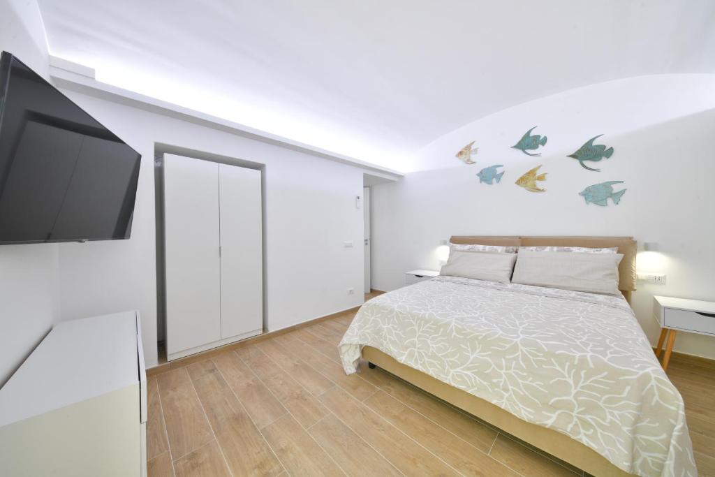 Postel nebo postele na pokoji v ubytování Casa GLEM