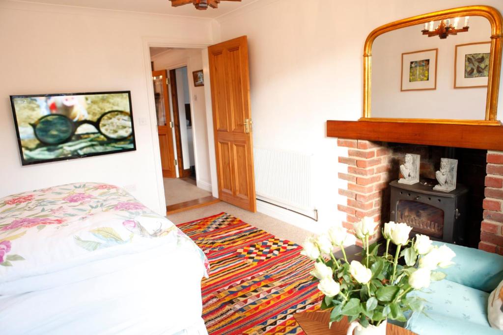 Postel nebo postele na pokoji v ubytování Swan Guest House LONDON - HEATHROW