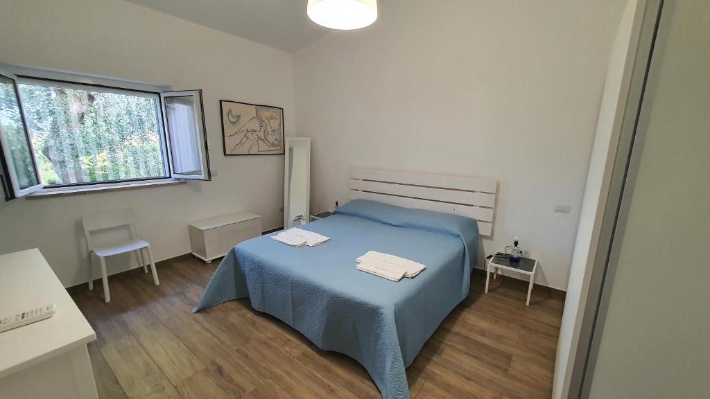 Postel nebo postele na pokoji v ubytování Villa Leone