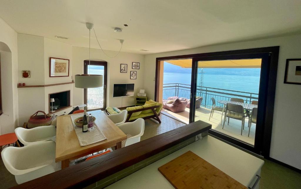 a living room with a view of the ocean at casa prima vista in Torri del Benaco