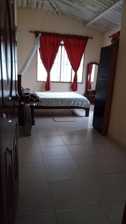 Postel nebo postele na pokoji v ubytování Casa de descanso - Finca Los Primos