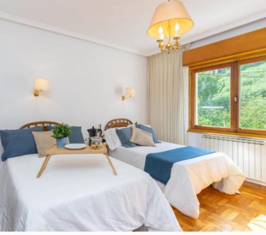 Postel nebo postele na pokoji v ubytování Casa San Esteban