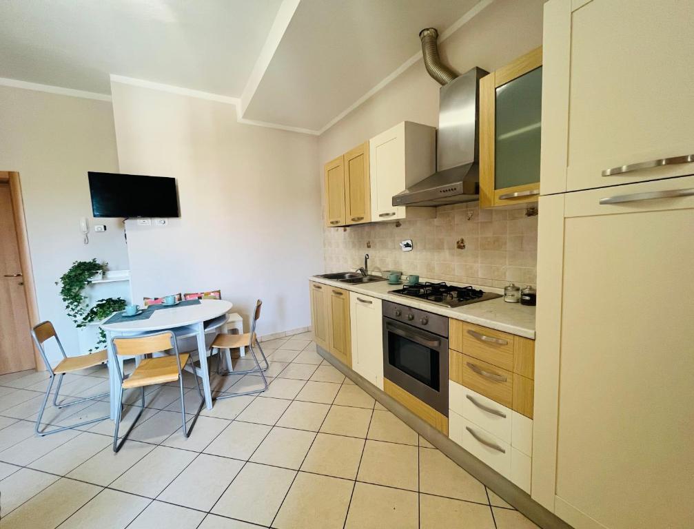 Kuchyň nebo kuchyňský kout v ubytování Casa Lungarno