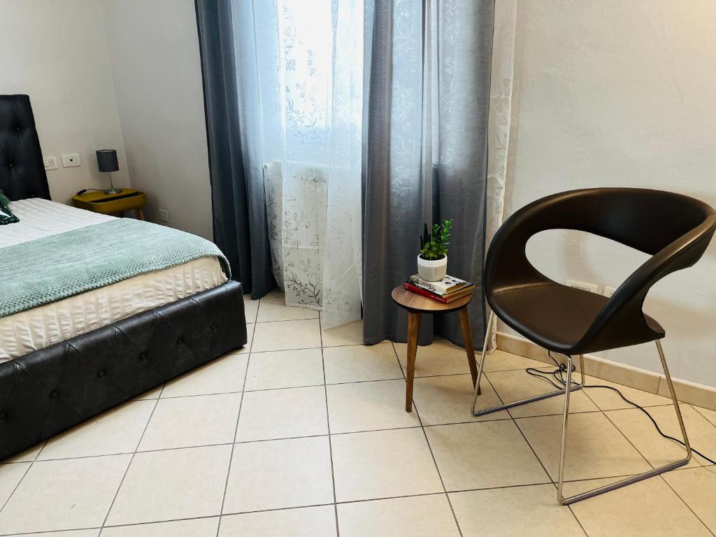 Postel nebo postele na pokoji v ubytování Casa Lungarno