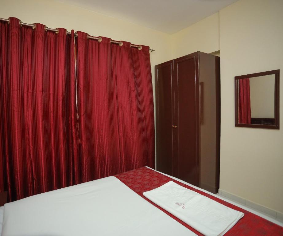 Postel nebo postele na pokoji v ubytování Al Sharq Hotel - BAITHANS