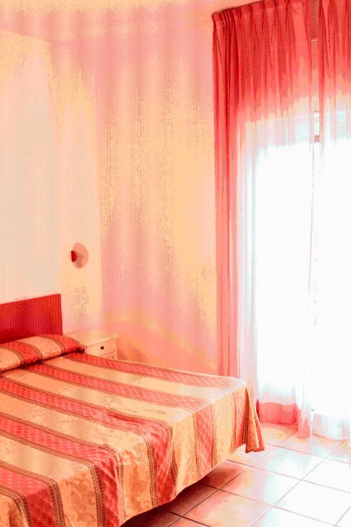 Postel nebo postele na pokoji v ubytování Hotel Costa Citara