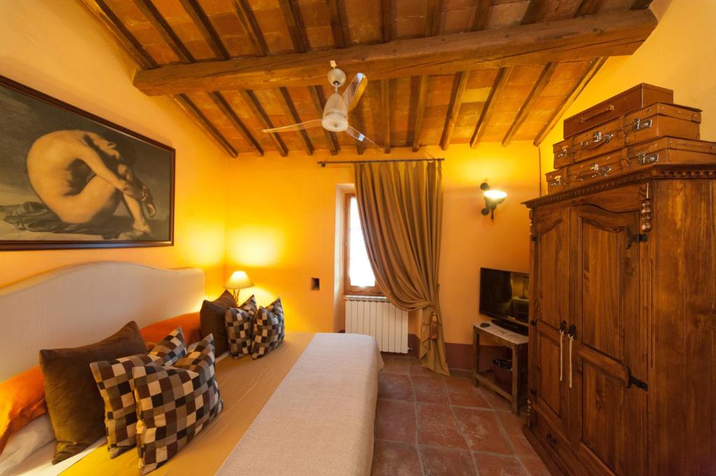 Uma cama ou camas num quarto em B&B Le Dimore Mezza Costa
