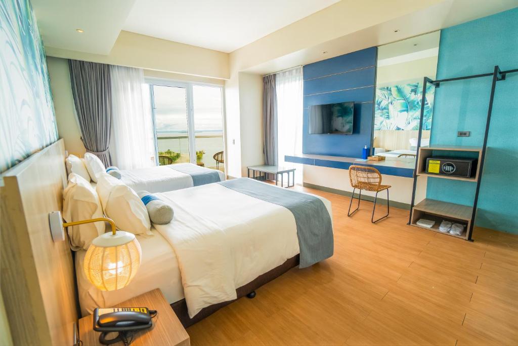 Solea Palm Resort Mactan TV 또는 엔터테인먼트 센터