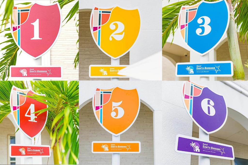 a group of signs with numbers on them at Hotel Santa Barbara Miyakojima Resort in Miyako-jima
