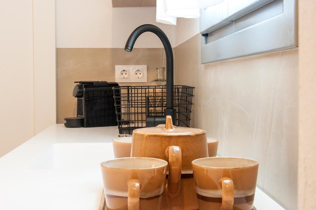Cuisine ou kitchenette dans l'établissement Paris Studios & Apartment