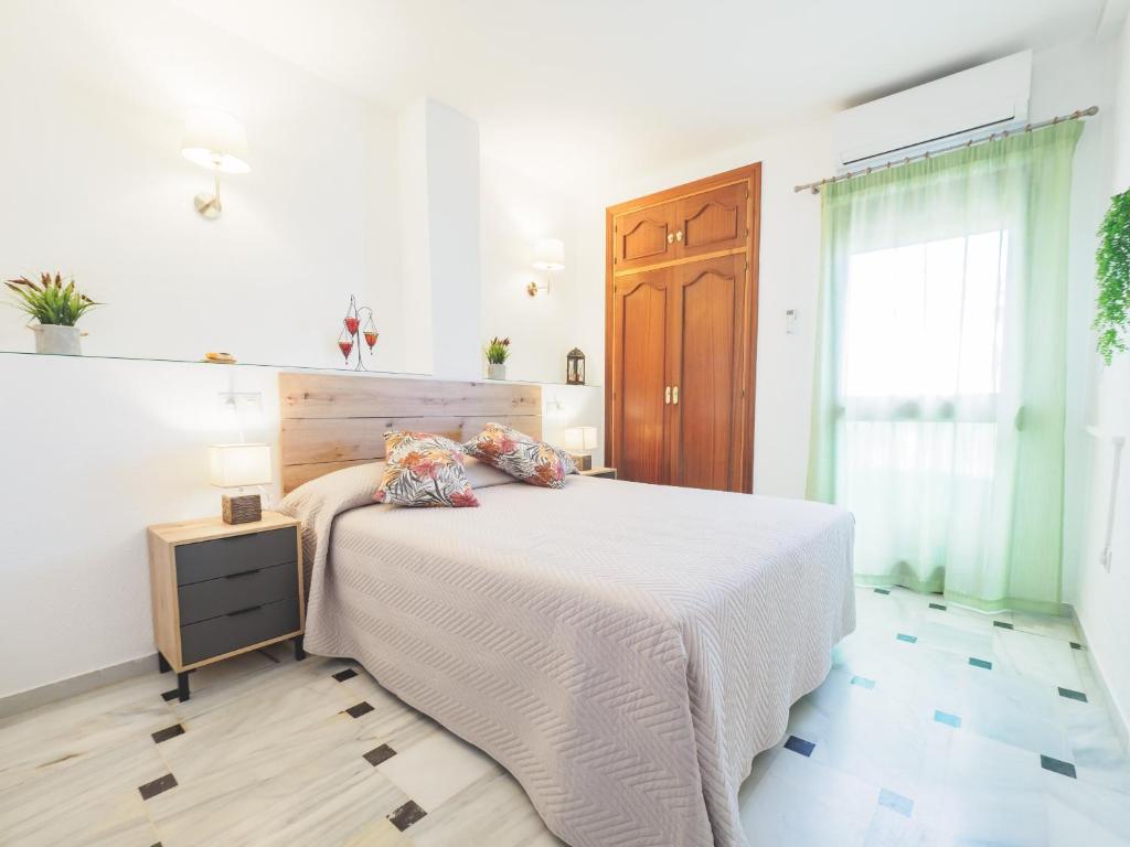 Postel nebo postele na pokoji v ubytování Cubo's Apartamento Oceanview Lubina