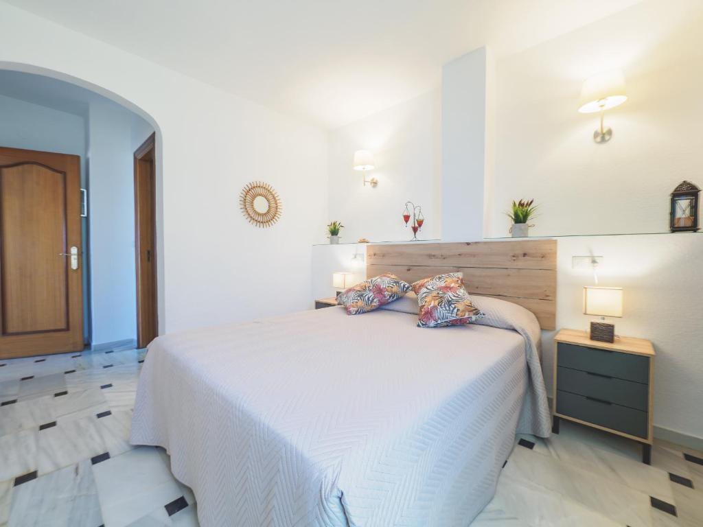 Postel nebo postele na pokoji v ubytování Cubo's Apartamento Oceanview Lubina