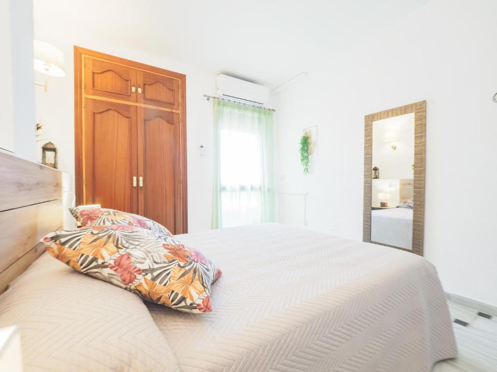 Postel nebo postele na pokoji v ubytování Cubo's Apartamento Oceanview Lubina