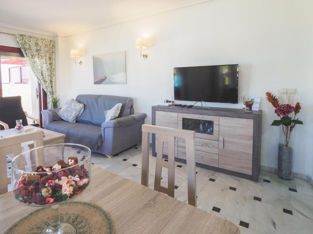 TV a/nebo společenská místnost v ubytování Cubo's Apartamento Oceanview Lubina