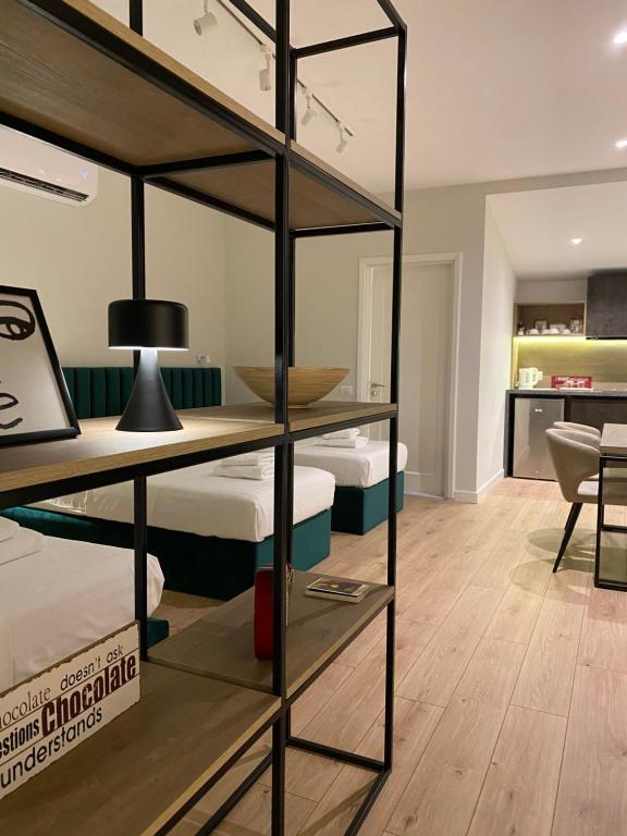 Postel nebo postele na pokoji v ubytování Living Studio Apartments
