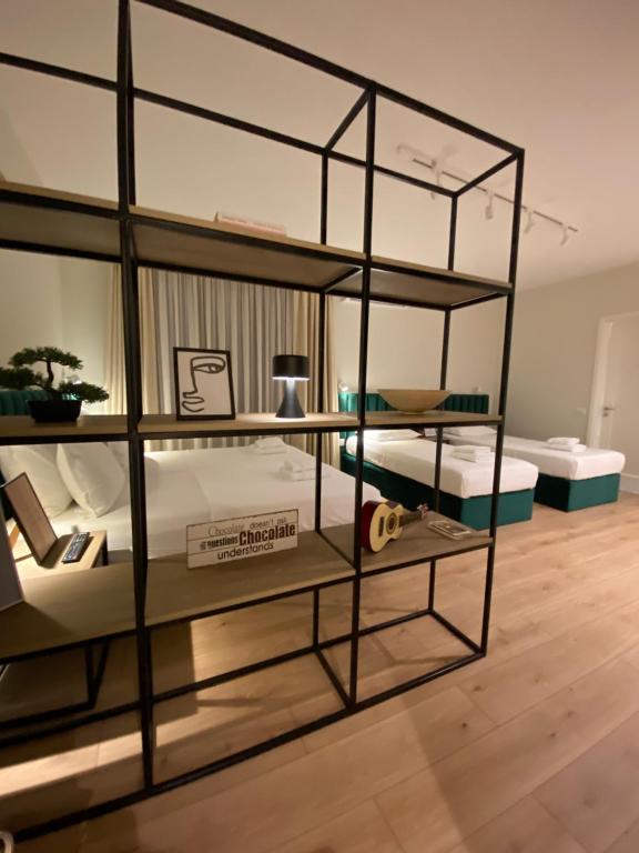 Postel nebo postele na pokoji v ubytování Living Studio Apartments