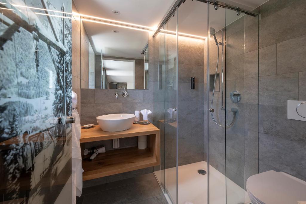 Koupelna v ubytování Berghotel Tgantieni