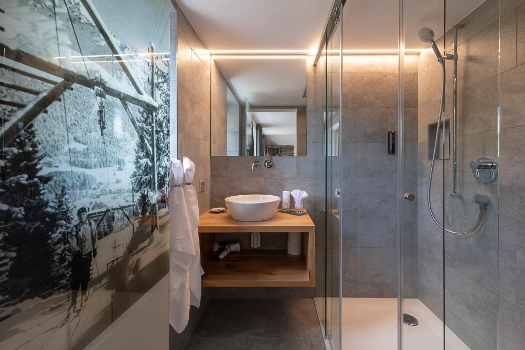 Koupelna v ubytování Berghotel Tgantieni