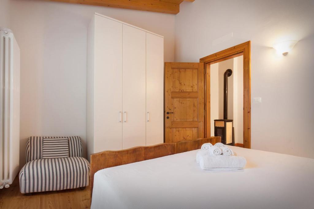 Posteľ alebo postele v izbe v ubytovaní Casa del Bosco
