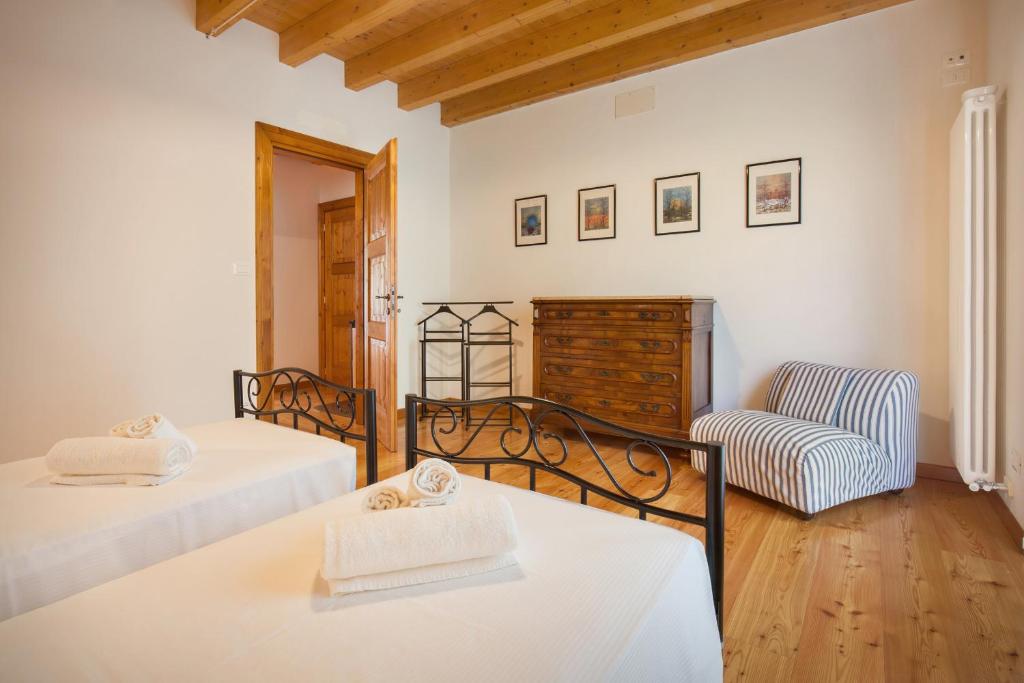 Posteľ alebo postele v izbe v ubytovaní Casa del Bosco