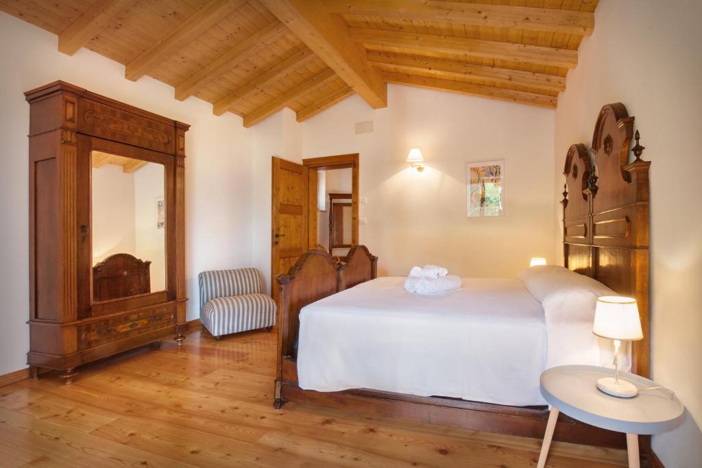 Posteľ alebo postele v izbe v ubytovaní Casa del Bosco