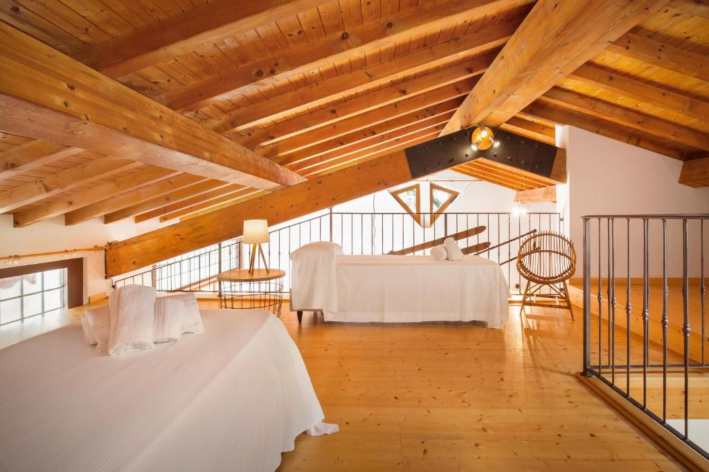 Posteľ alebo postele v izbe v ubytovaní Casa del Bosco