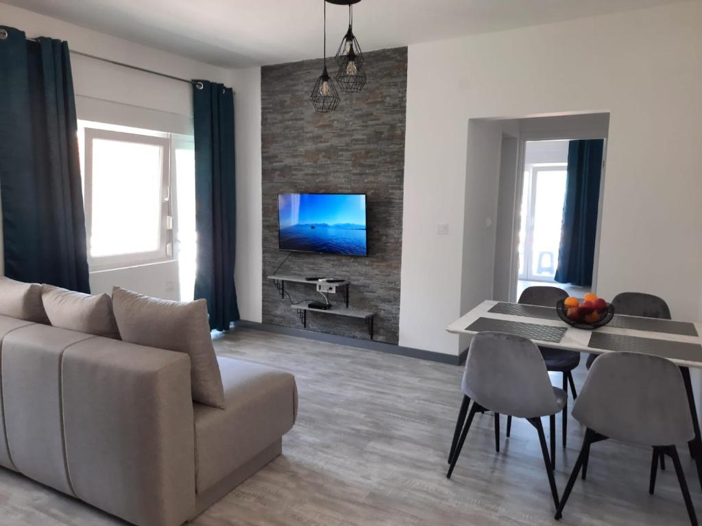TV a/nebo společenská místnost v ubytování Seaside Village