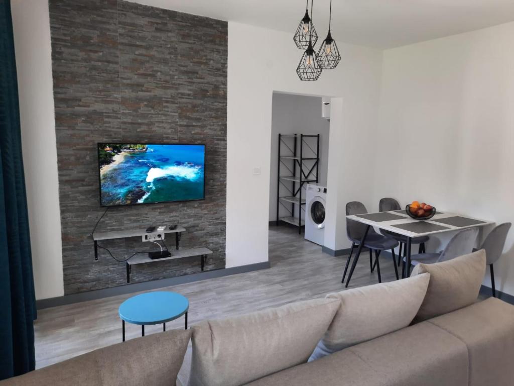 TV a/nebo společenská místnost v ubytování Seaside Village