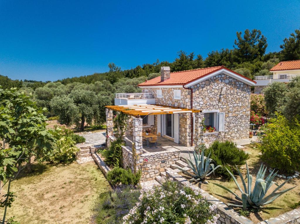 a stone house with a view at VILLA HELIODORE in Astris