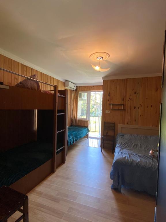 Postel nebo postele na pokoji v ubytování Guest House Mari